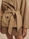 short camel trench coat with tie belt from varley close up