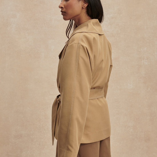 short camel trench coat with tie belt from varley side view 