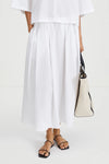 elasticated waist voluminous white cotton skirt model