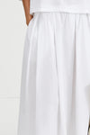elasticated waist voluminous white cotton skirt close up
