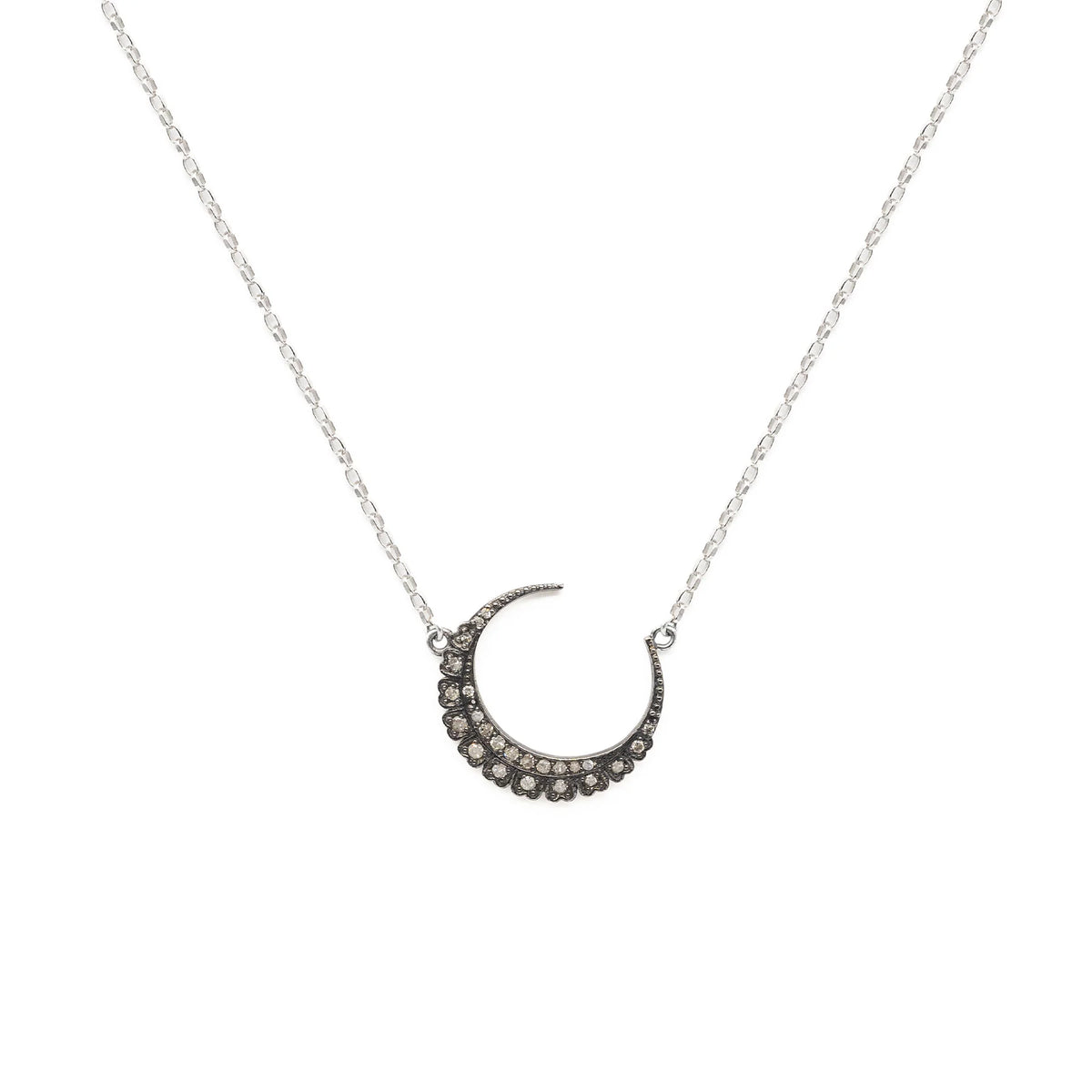 White gold plated sterling silver necklace with a diamond studded pave crescent 