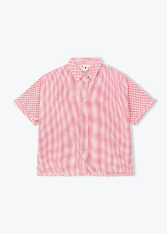 Pink checkered shirt on a white background