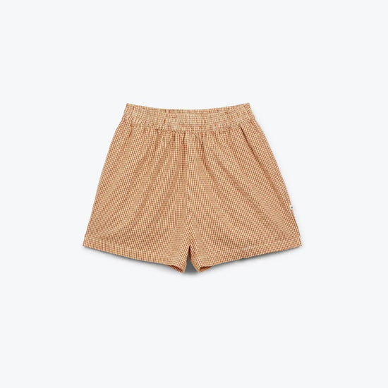 Beige checkered shorts on a white background