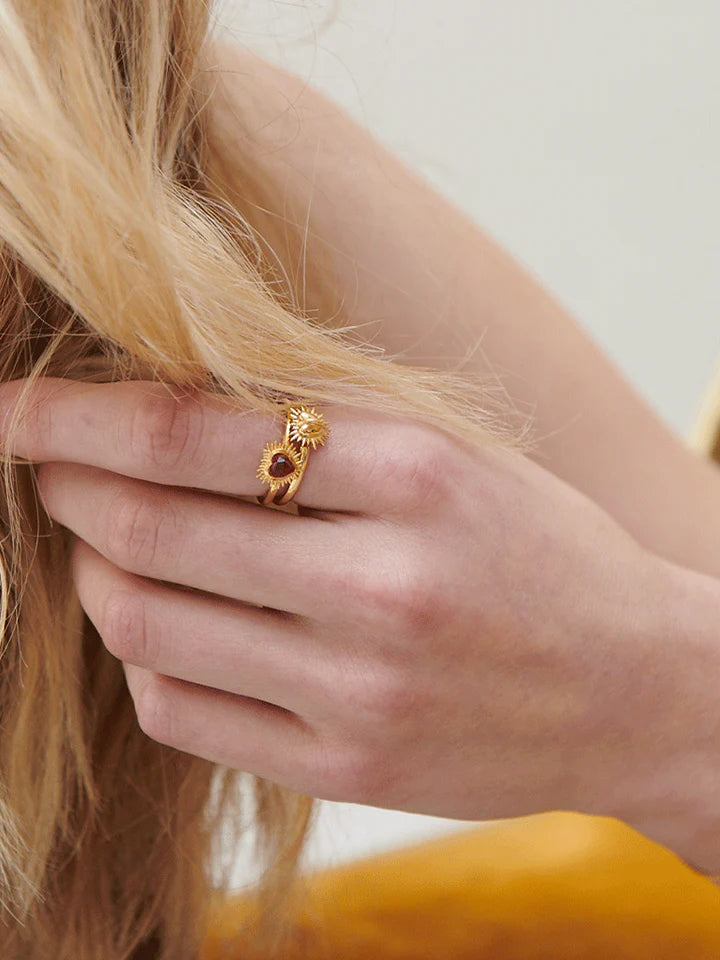 heart shaped spiky ring with red stone and adjustable band from rachel jackson model shot