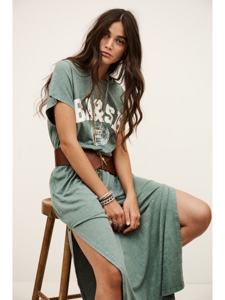 Woman wearing green t shirt dress with brown belt from ba&sh