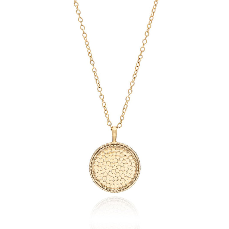 Gold medallion necklace on a gold 30 inch chain