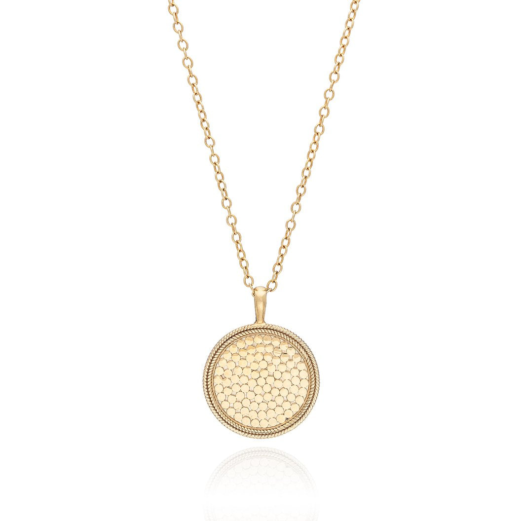 Gold medallion necklace on a gold 30 inch chain