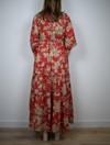 Scopp neck red maxi dress with taupe floral print shirt dress with triple layered skirt and elbow length raglan