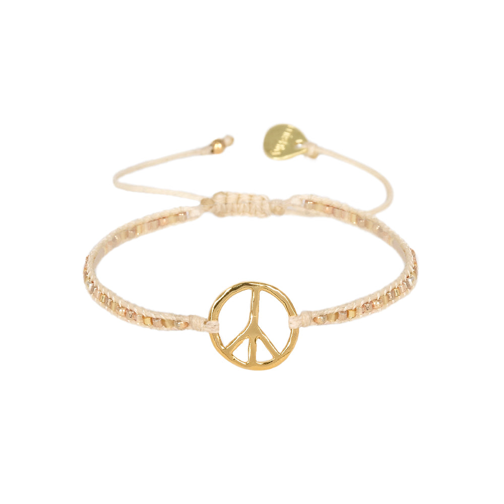 Gold coloured beaded bracelet with a peace sign 