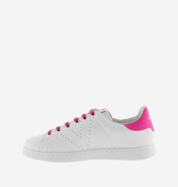 White trainers with neon pink laces and heel