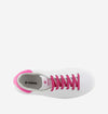 White trainers with neon pink laces and heel
