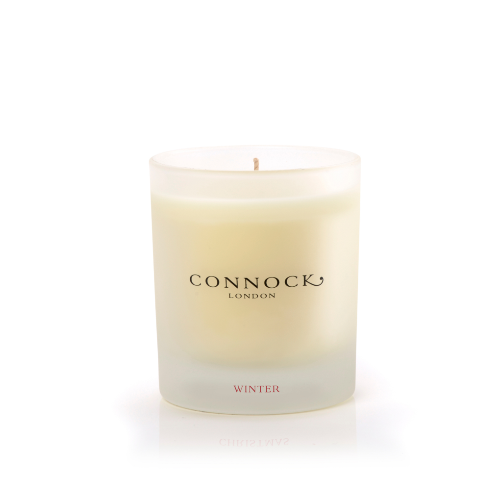 Winter fragrance candle in a glass