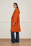 Orange double breasted over coat with classic collar and lapel, long sleeves and knee length