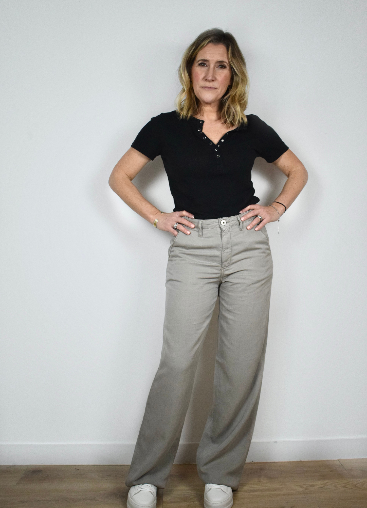 Wide leg grey trousers with mid to high rise 