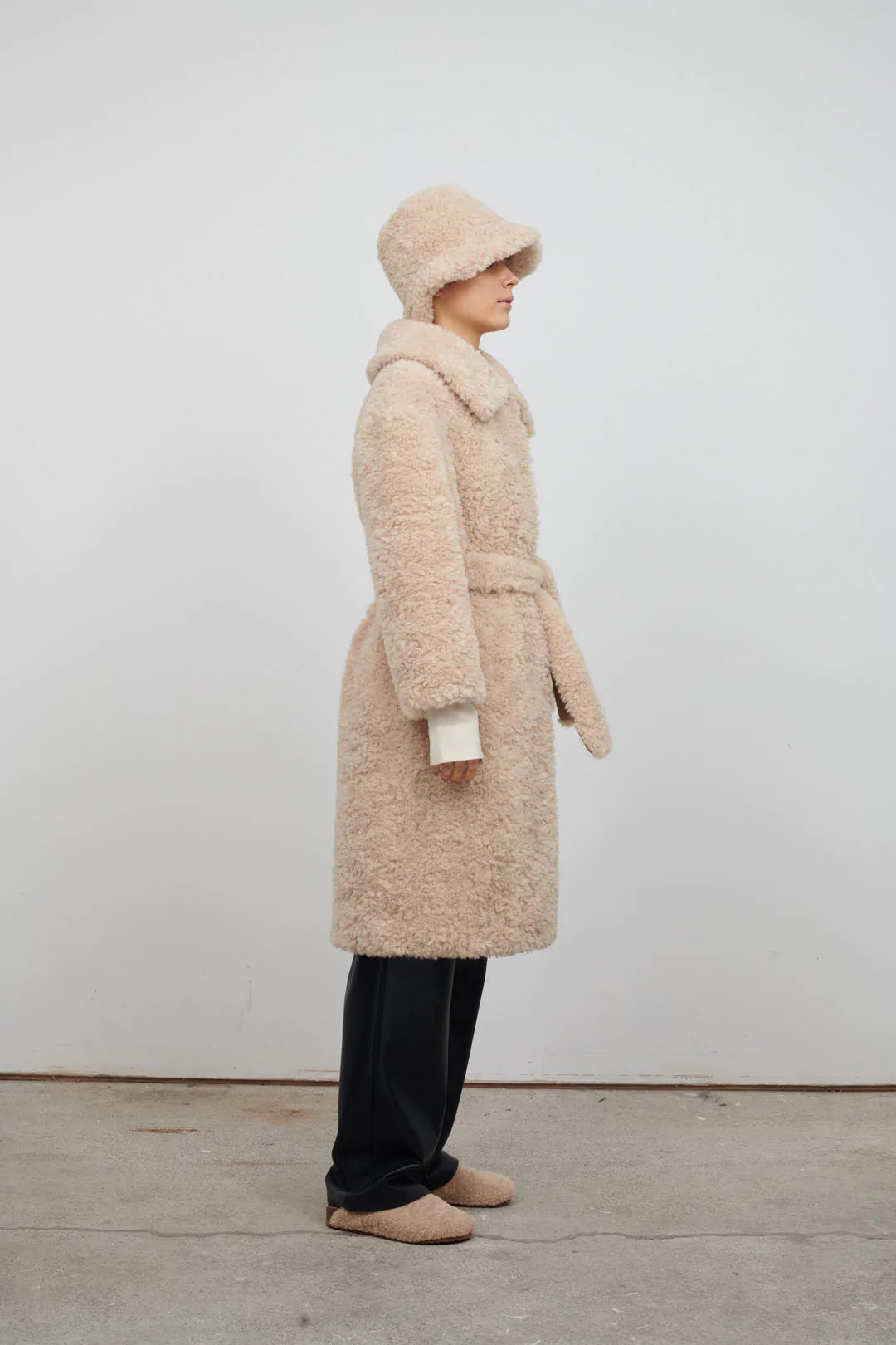 Midi length faux fur coat with large collar V neck and three popper fastenings