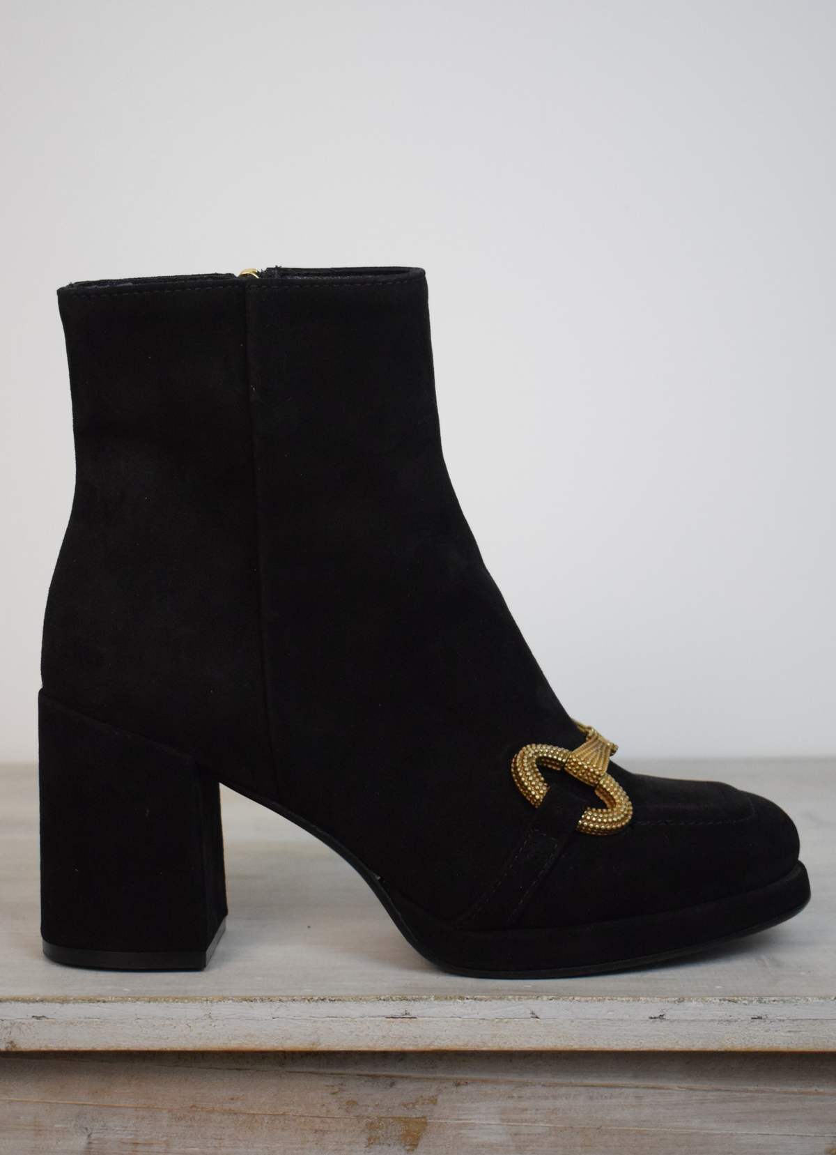Black suede boot with gold buckle 