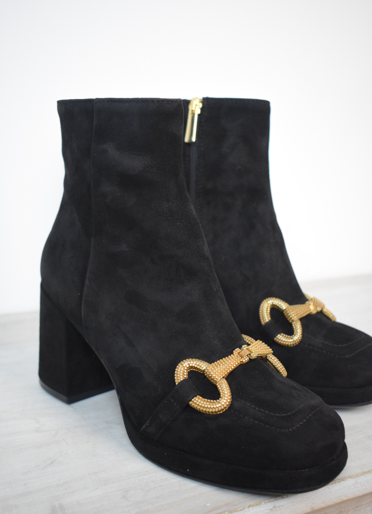 Black suede boot with gold buckle 