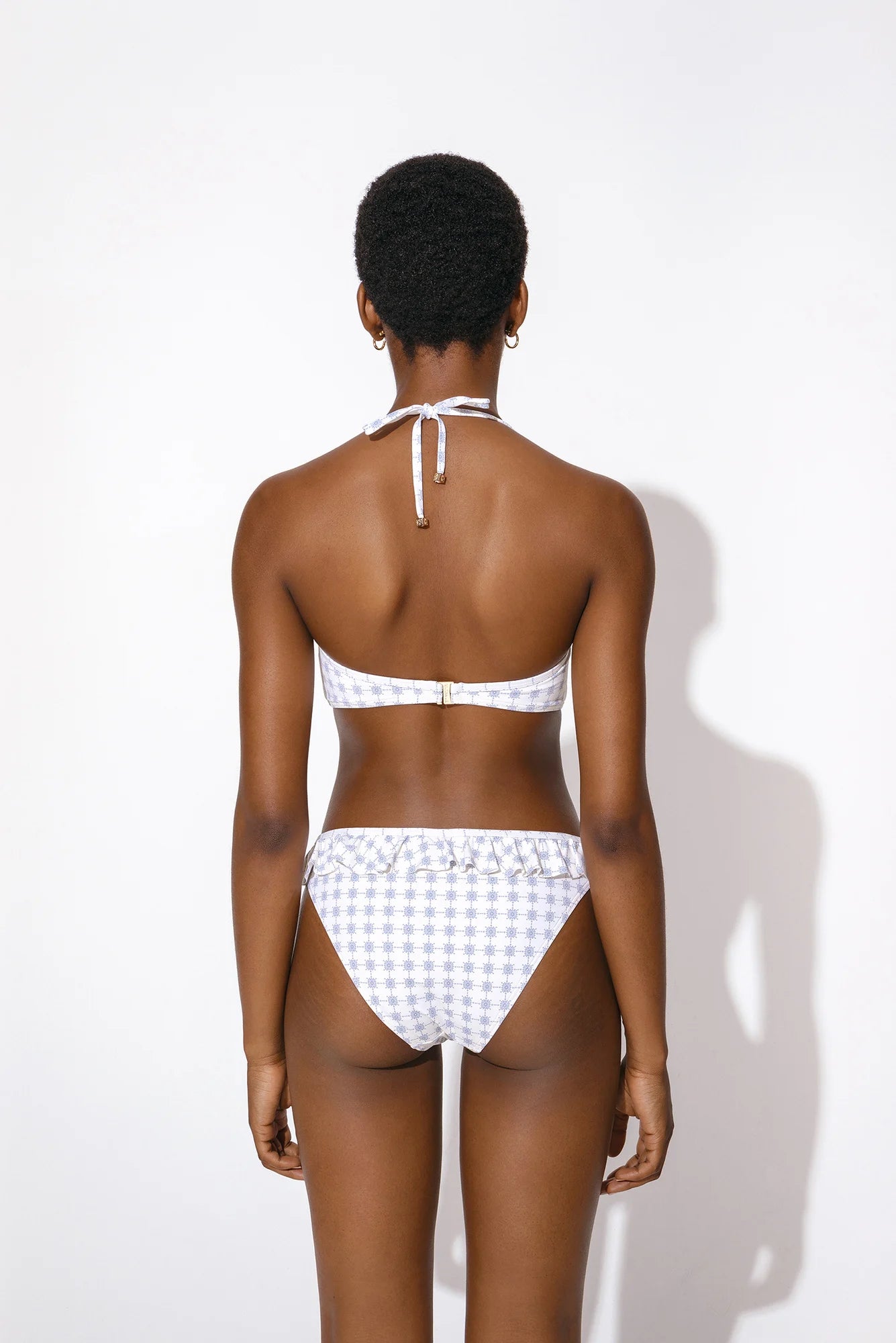 Ecru bikini bottoms with frill detail
