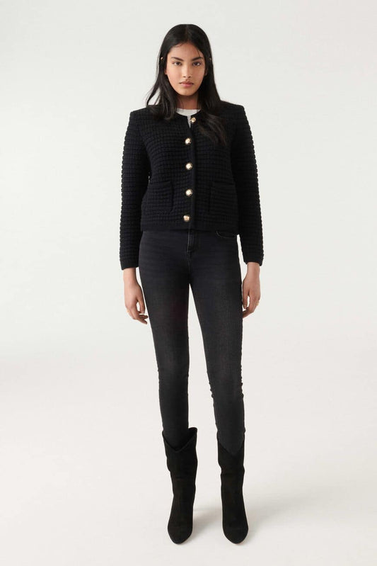 Cropped black chunky knitted cardigan with gold and enamel buttons crew neck and slightly cropped sleeves