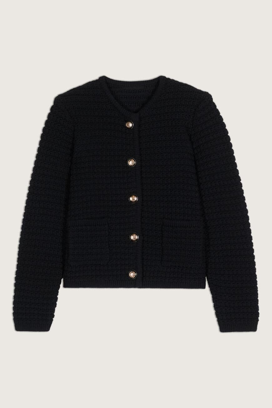 Cropped black chunky knitted cardigan with gold and enamel buttons crew neck and slightly cropped sleeves