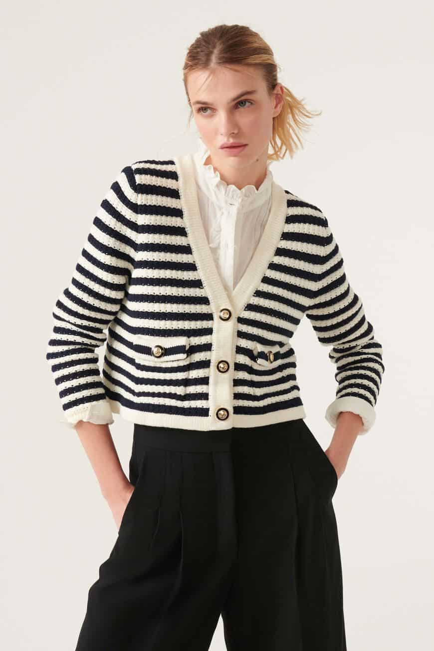 Navy and ecru striped low v neck cardigan with pockets and gold metallic and black enamel buttons