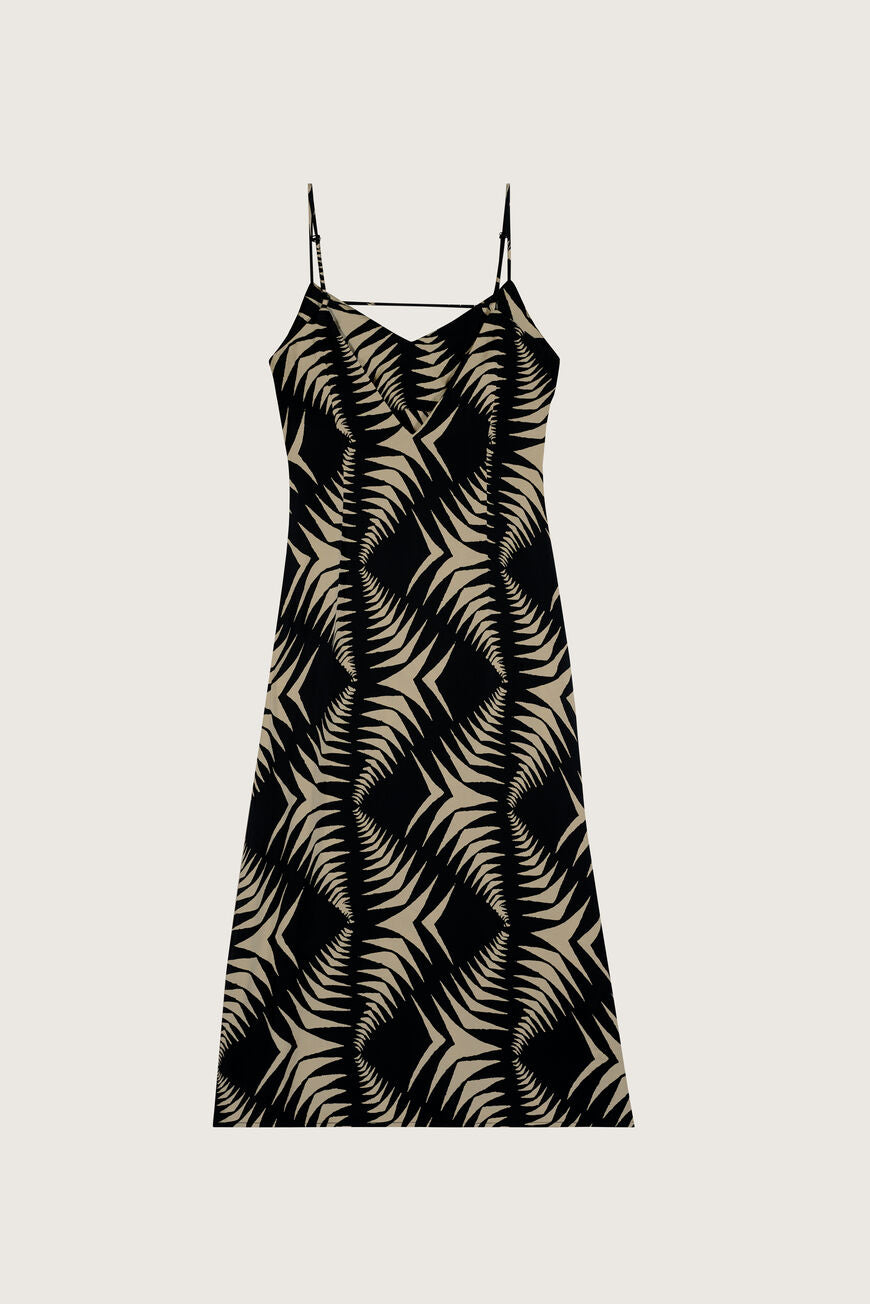 V neck satin look slip dress with geometrical pattern in black and taupe midi length with adjustable spaghetti straps with a horizontal strap at the back