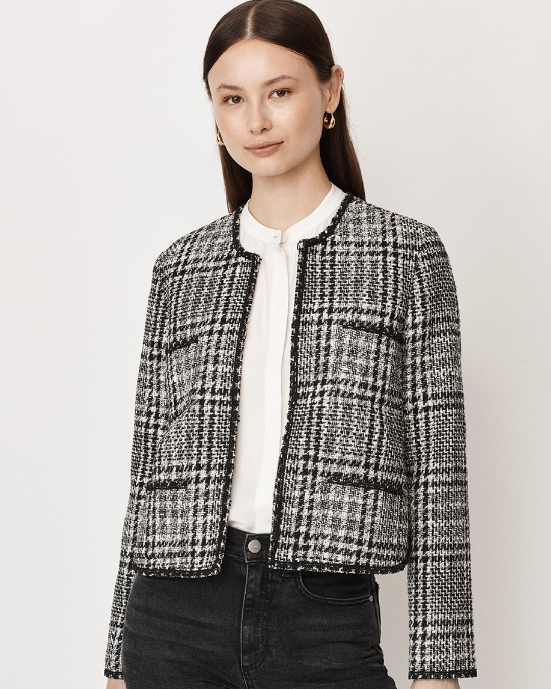 Black and white woven check collarless blazer with 4 pocket detail