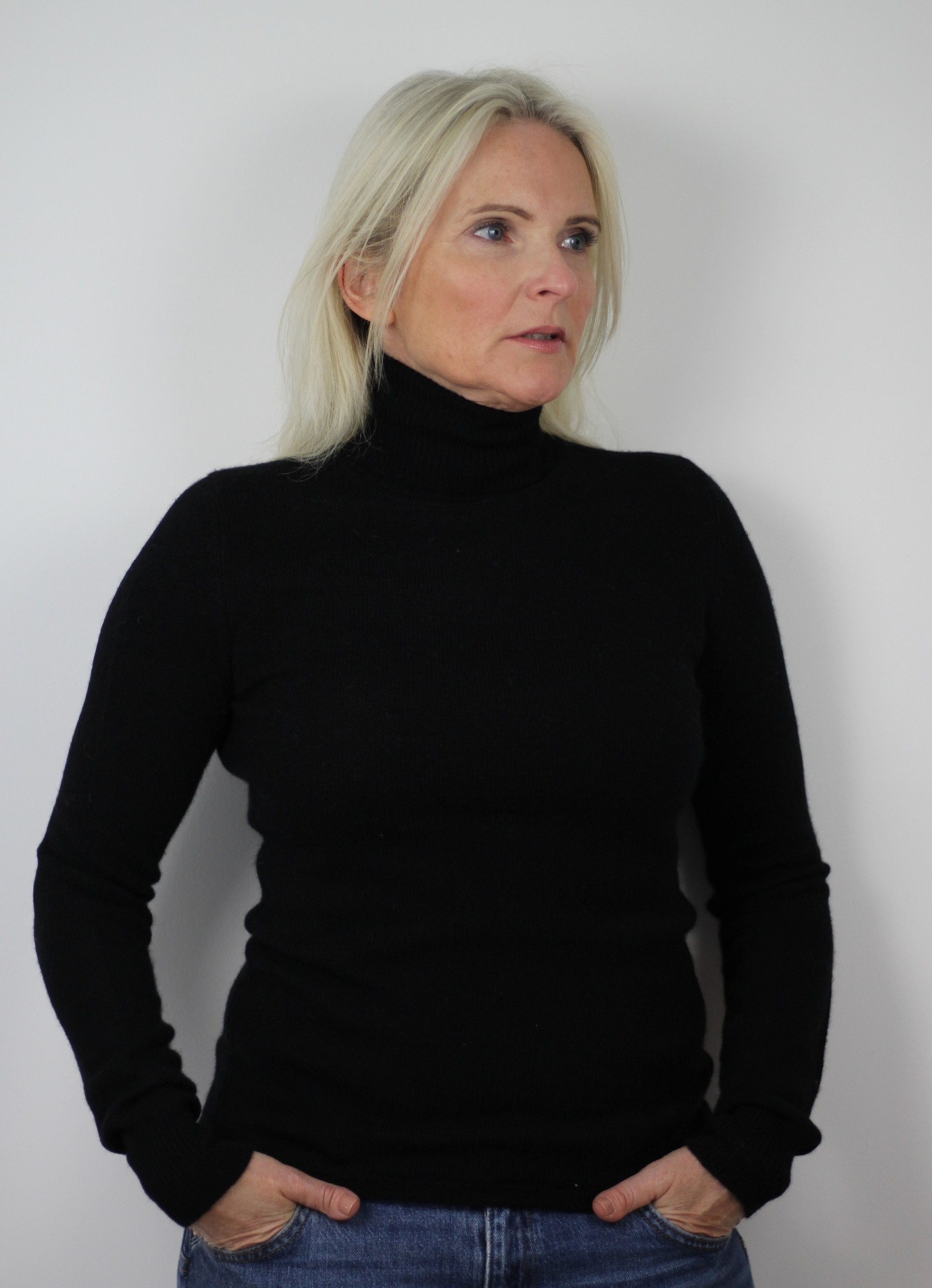 Black roll neck jumper