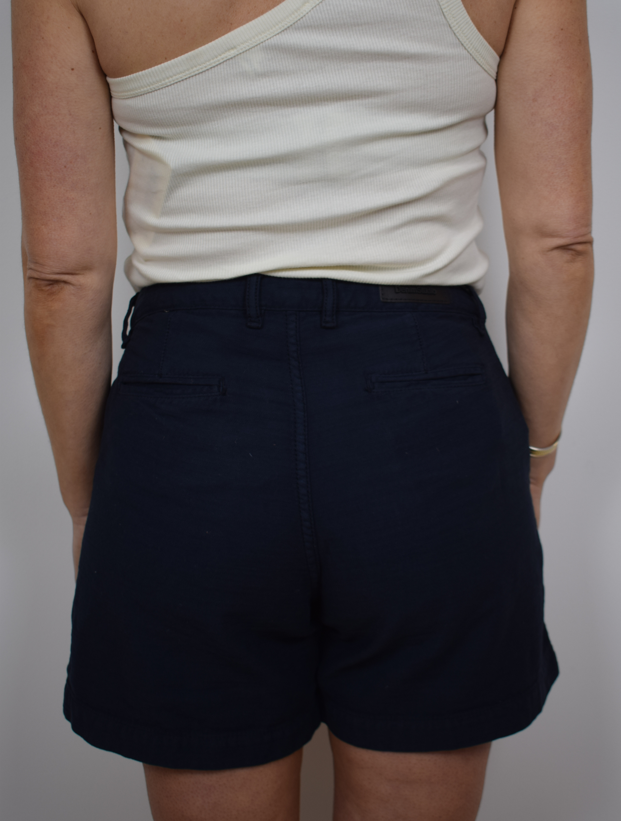 Navy mid rise shorts with zipper a button fastening