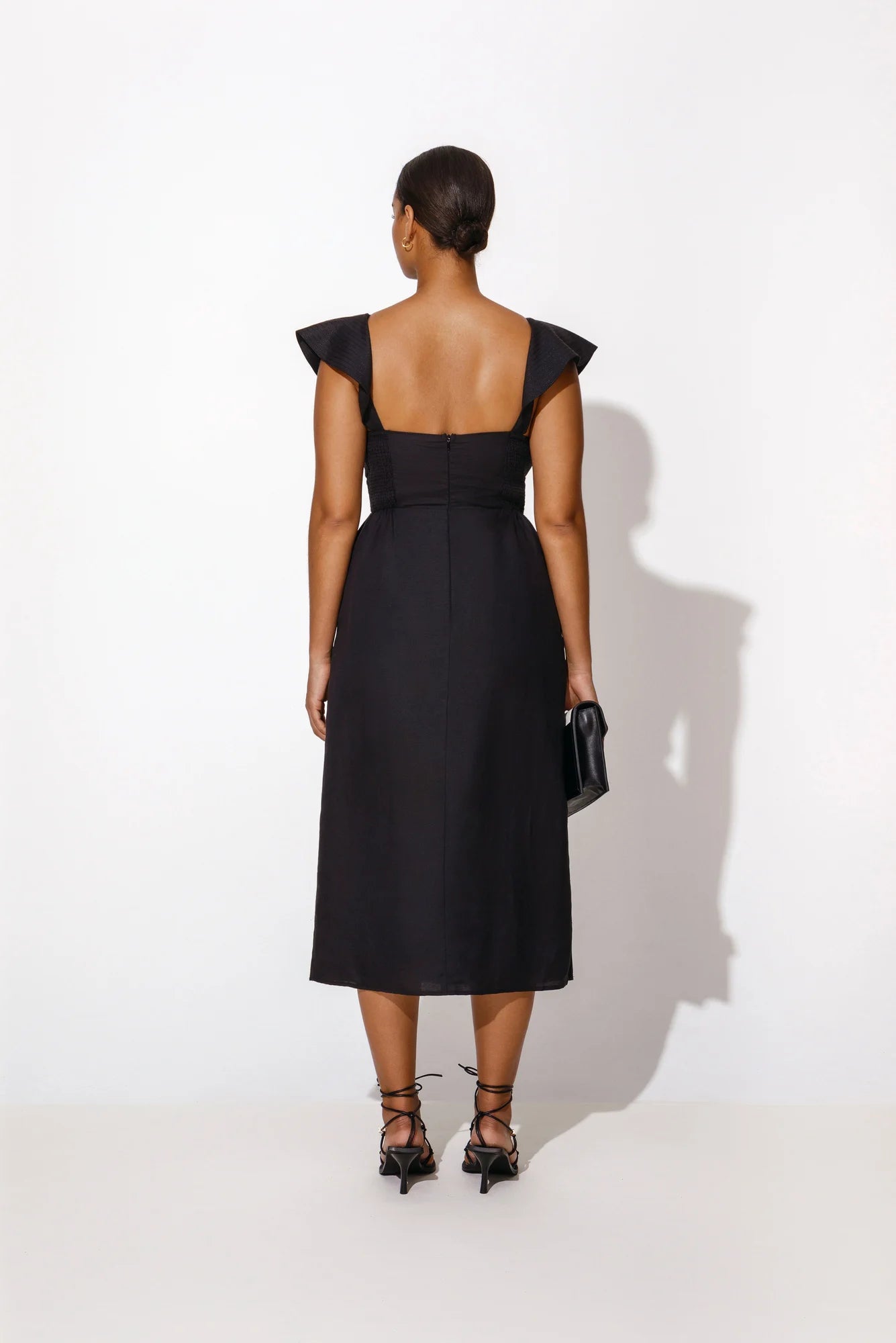 Black summer midi dress with cut out under the bust and frills over the shoulders