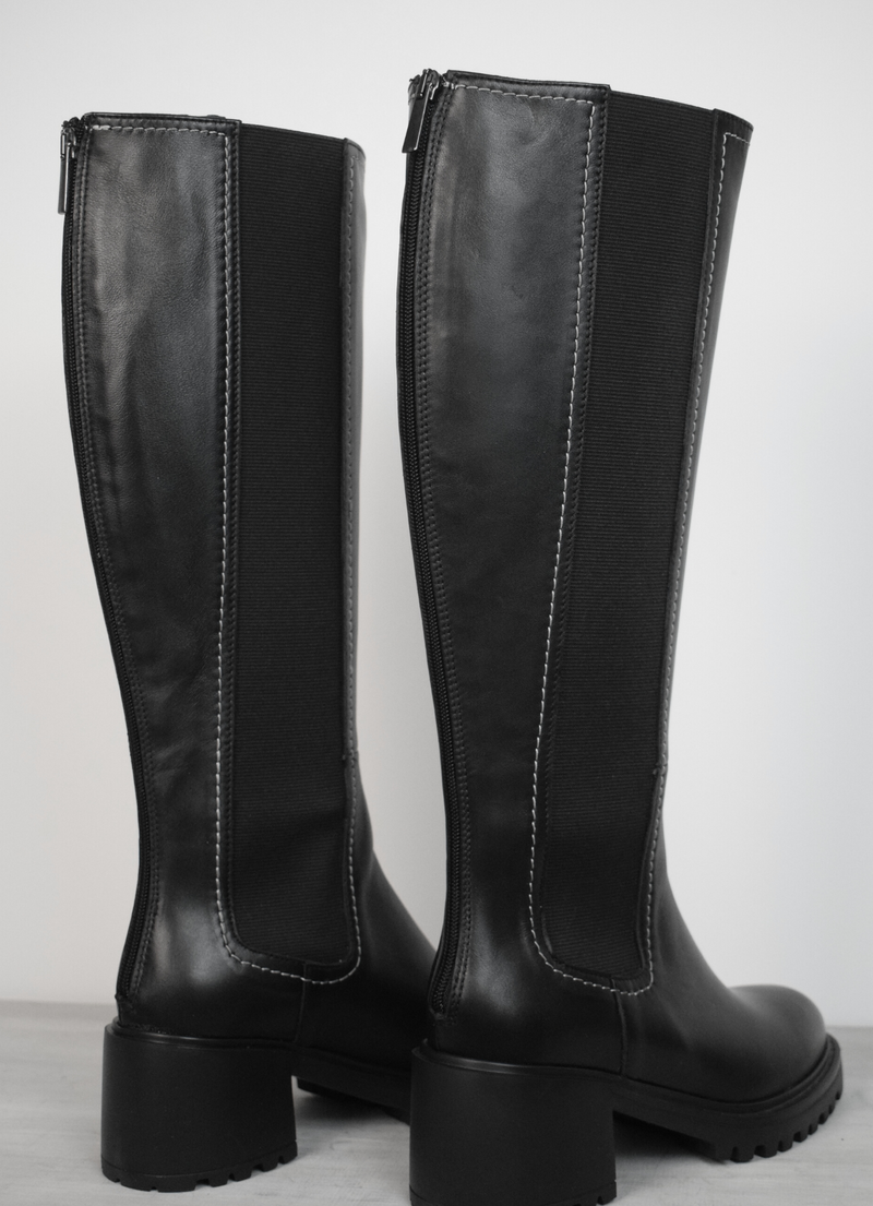 Black knee high boot with white edging and block heel 