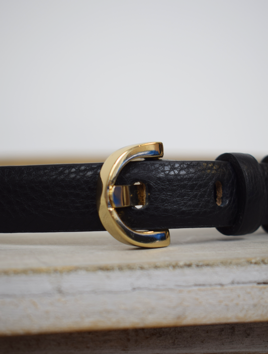 Thin black leather belt with gold D shaped buckle