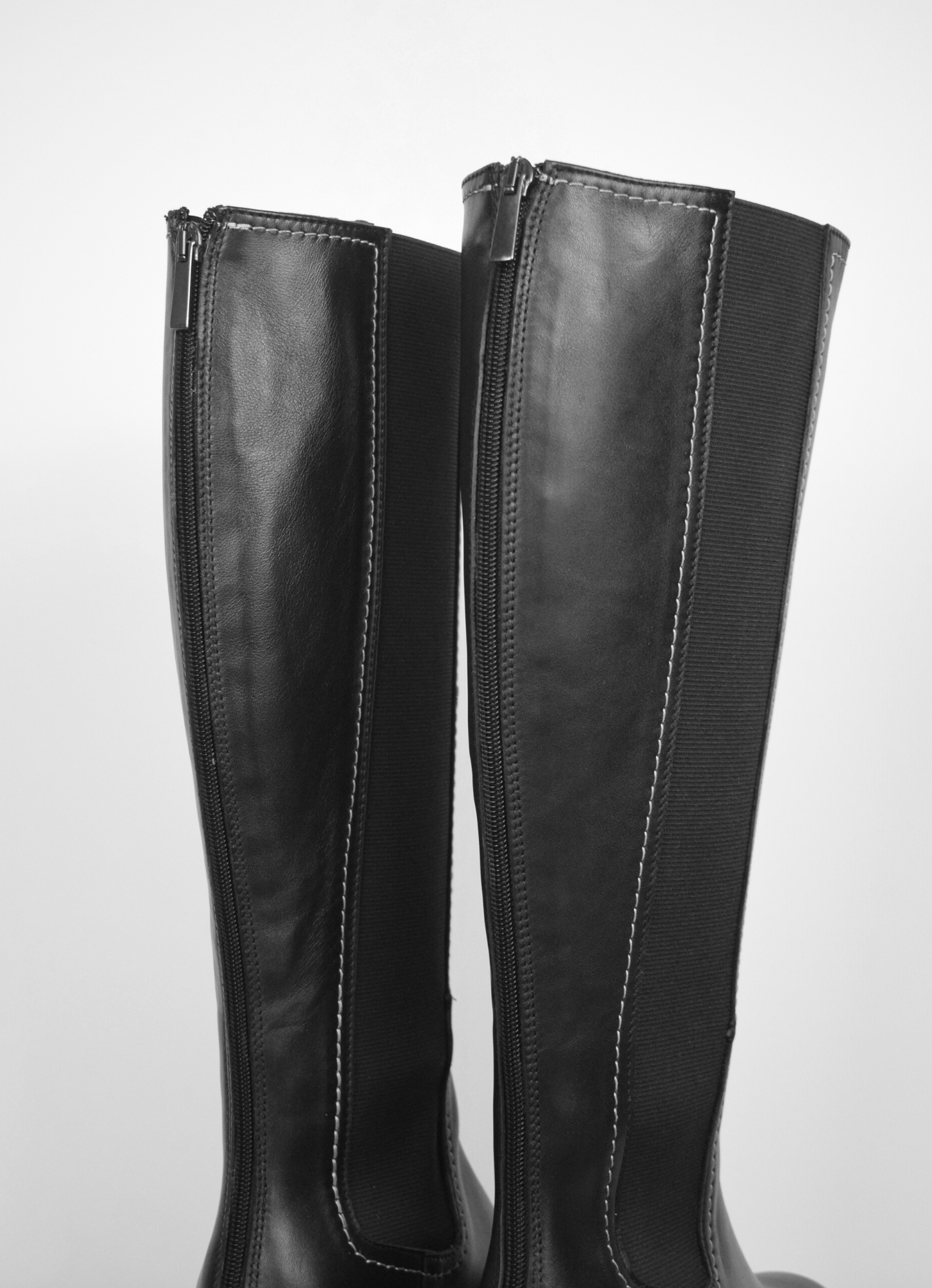 Black knee high boot with white edging and block heel 