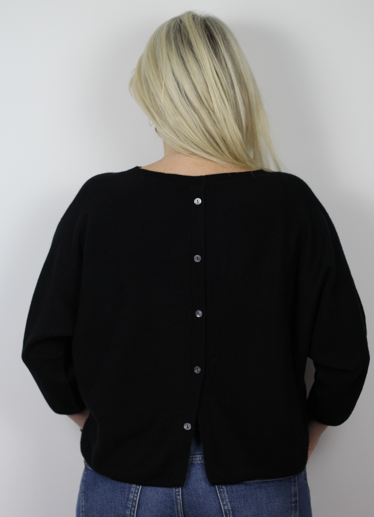 Black Cashmere 3/4 length sleeve knit with button back detail