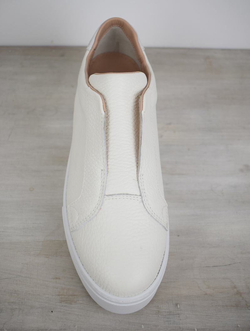 White platform trainers will elasticated side panels to make them easy to pull on