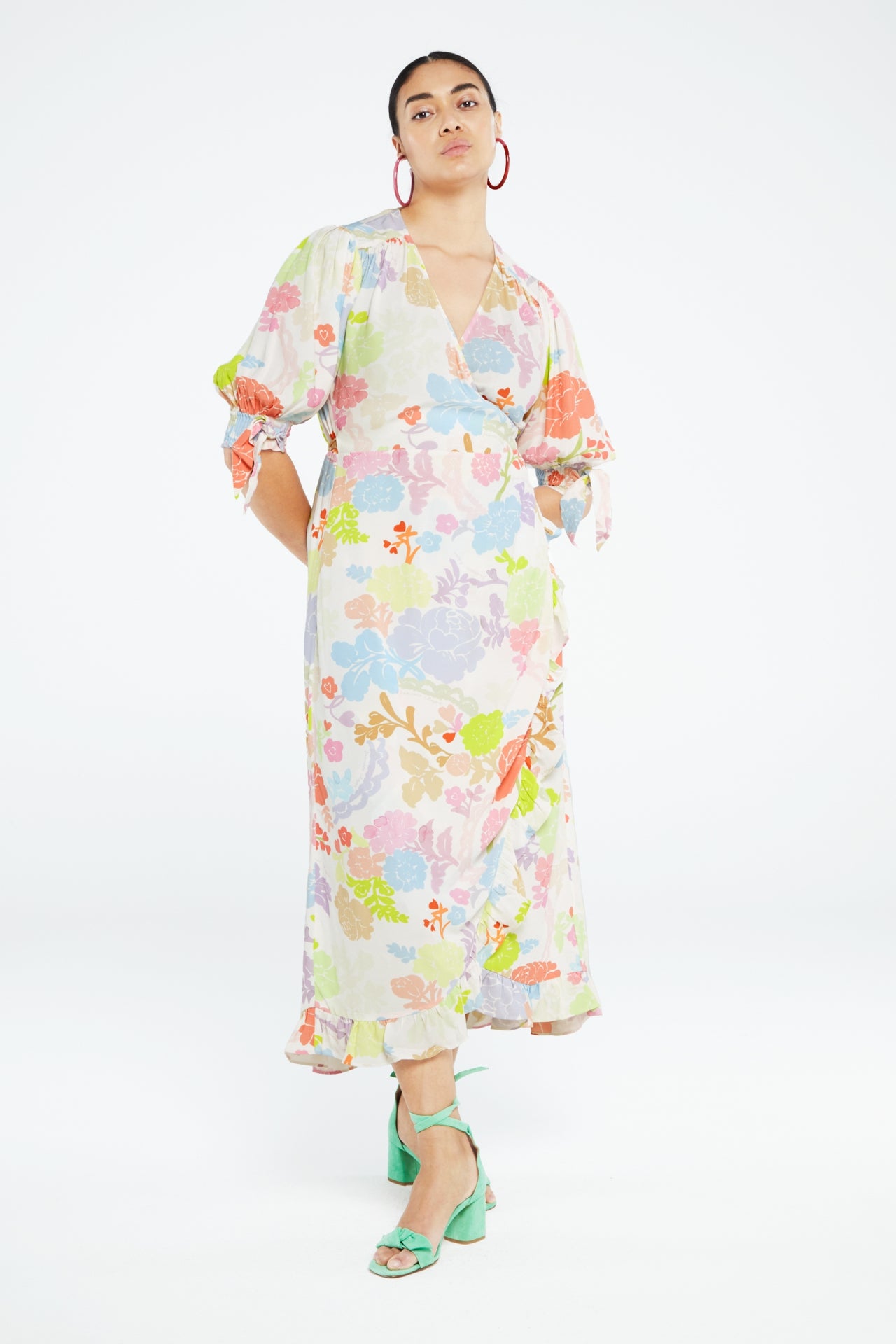 Multi colour on ecru wrap dress with short sleeves and tie cuffs