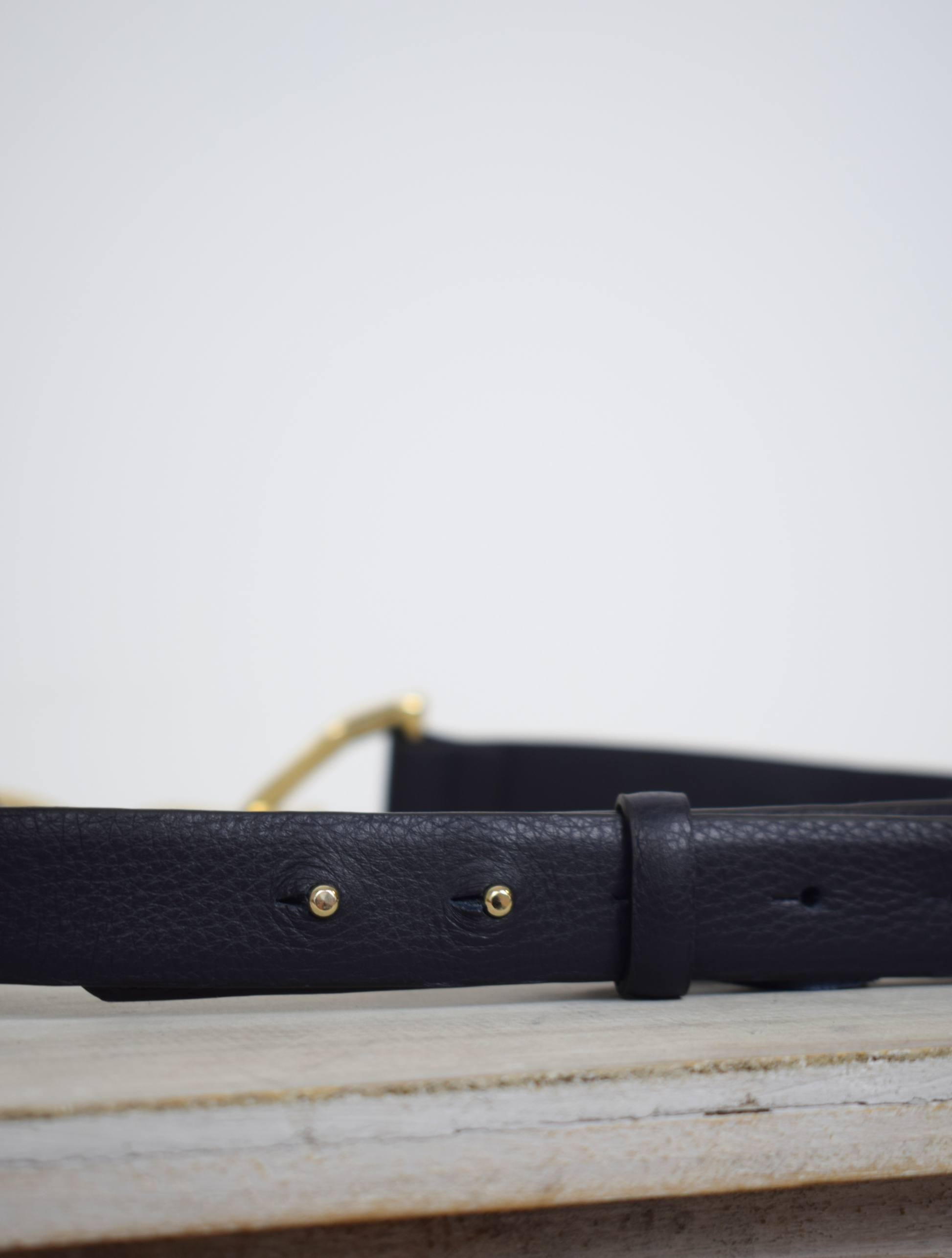 Black link chain belt with gold metallic hardware