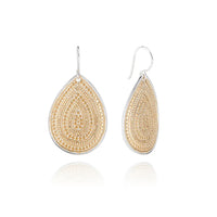 Large teardrop slightly curved drop earrings with silver post hook and gold dot decoration 
