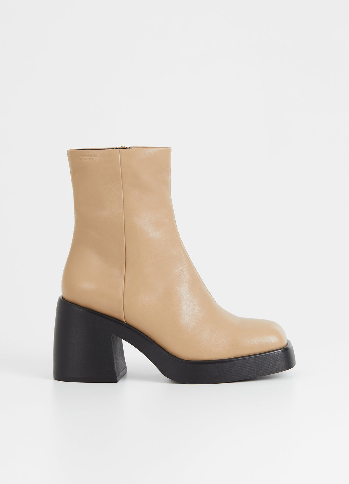 Beige leather boots on a chunky sole with side zip
