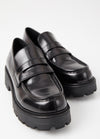 Polished black chunky penny loafers