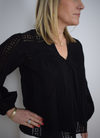 Black v neck blouse with broiderie anglaise 