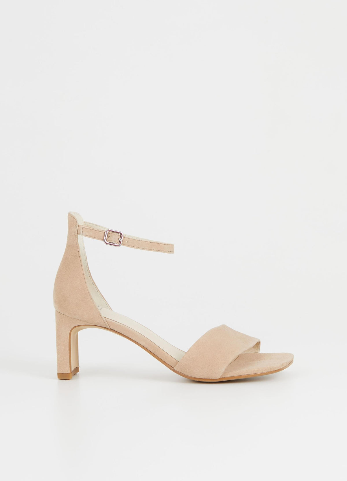Light beige low heels with single suede strap and ankle strap
