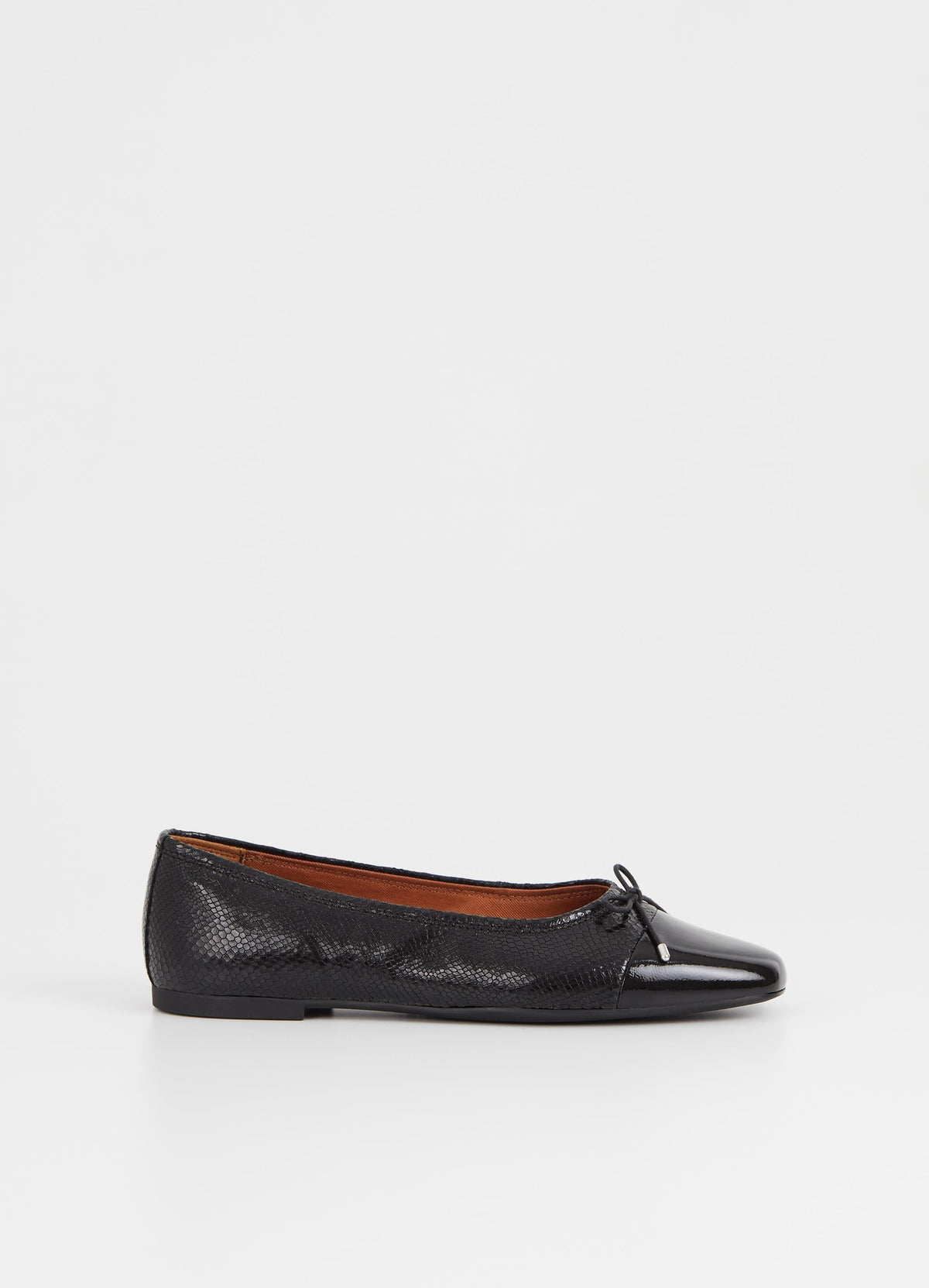 Black leather ballet pump with croc effect leather a patent toe and tie details with silver tips