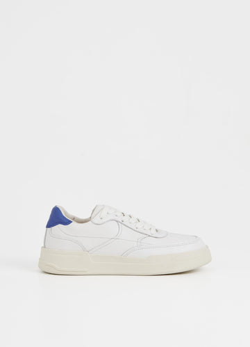 White trainer with cobalt blue heel and white laces