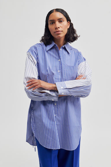 Oversized blue and white striped shirt with contrast white and blue striped arms