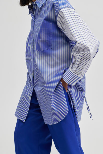 Oversized blue and white striped shirt with contrast white and blue striped arms