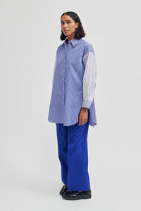 Oversized blue and white striped shirt with contrast white and blue striped arms