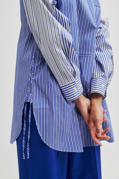 Oversized blue and white striped shirt with contrast white and blue striped arms