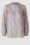 Semi sheer ecru top with ditsy blue orange and lavender floral print with full length placket long sleeves and single button fastening