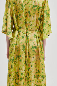 Green printed dress with removable tie belt and pockets